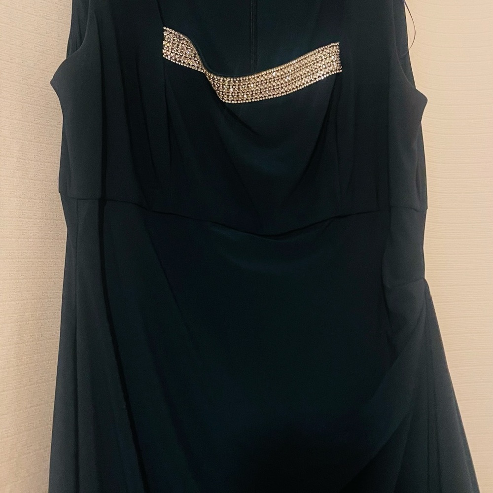 Gorgeous beautiful green color dress with hidden tummy and a jacket